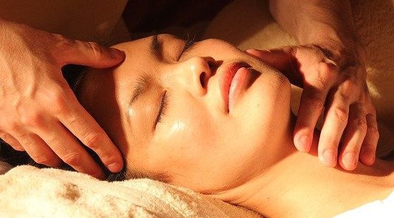 Image of lady getting face massage